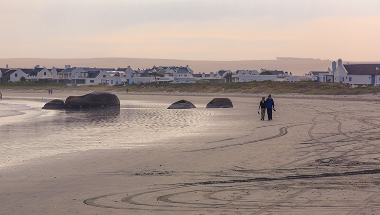 Couple walking on Paternoster Beach